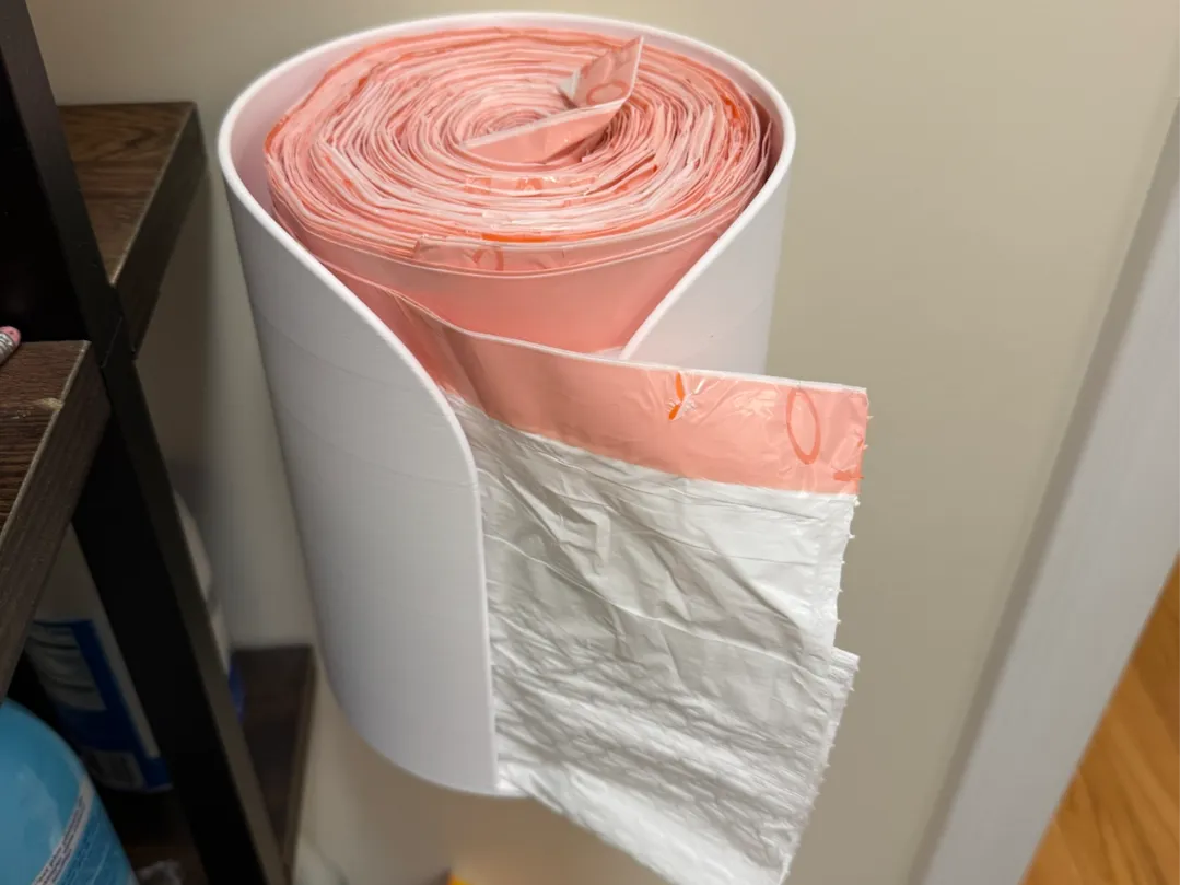 Trash Bag Tamer: Simple dispensing for big rolls by Adam L